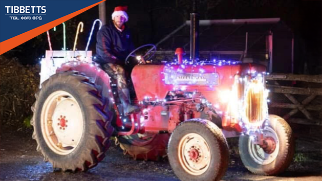 Tomas Stewart and his Christmas-themed tractor at the Banbury Christmas Tractor Run 2024